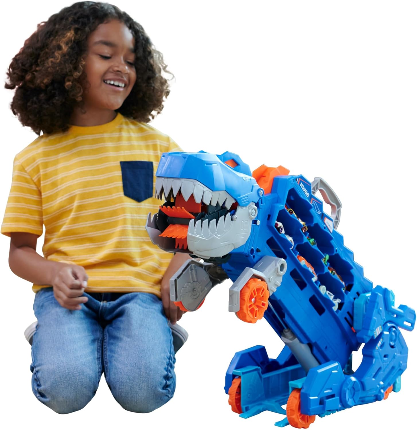 Hot Wheels Let’s Race Netflix - Camion City Transporteur T-Rex Qui Se Cabre pour Se Transformer en T-Rex avec Piste De Course, Lumières Et Sons, Jouet Enfant, Dès 3 Ans, HNG50