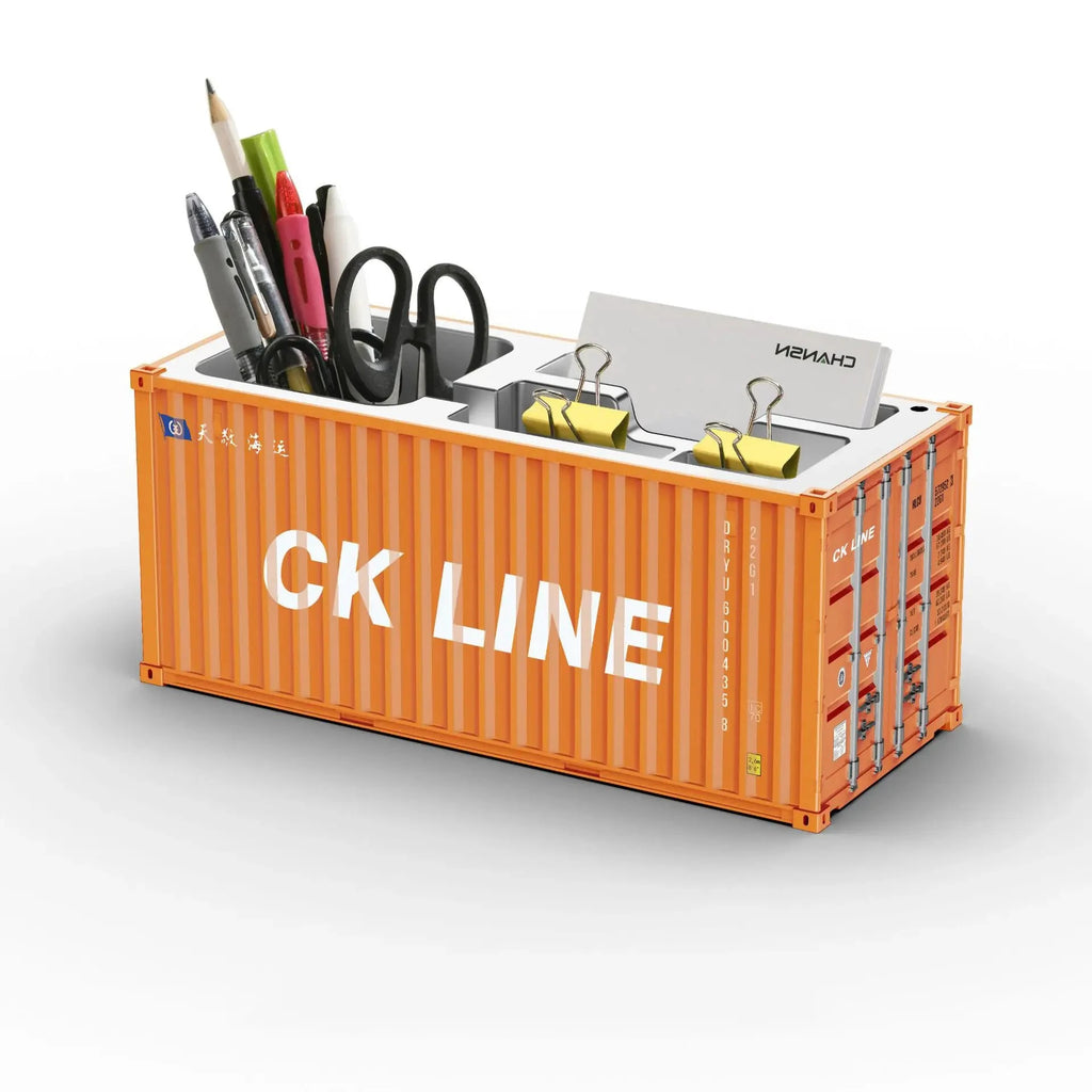 Porte-stylos orange en forme de conteneur maritime, organisateur bureau CK LINE avec stylos et ciseaux.