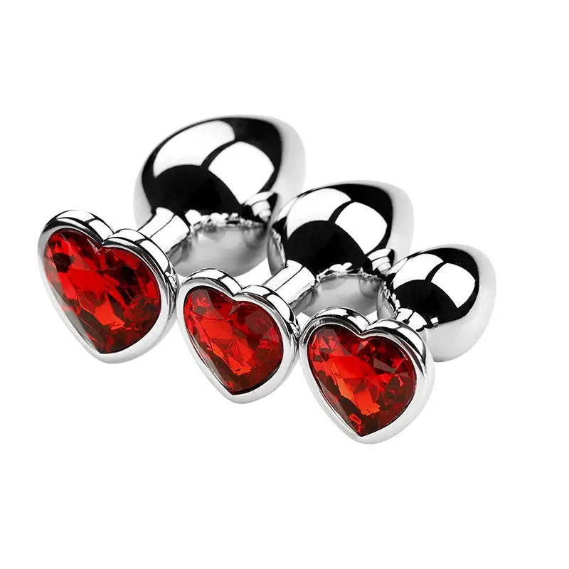 Plug anal en métal avec cristal cœur rouge – set de 3 tailles
