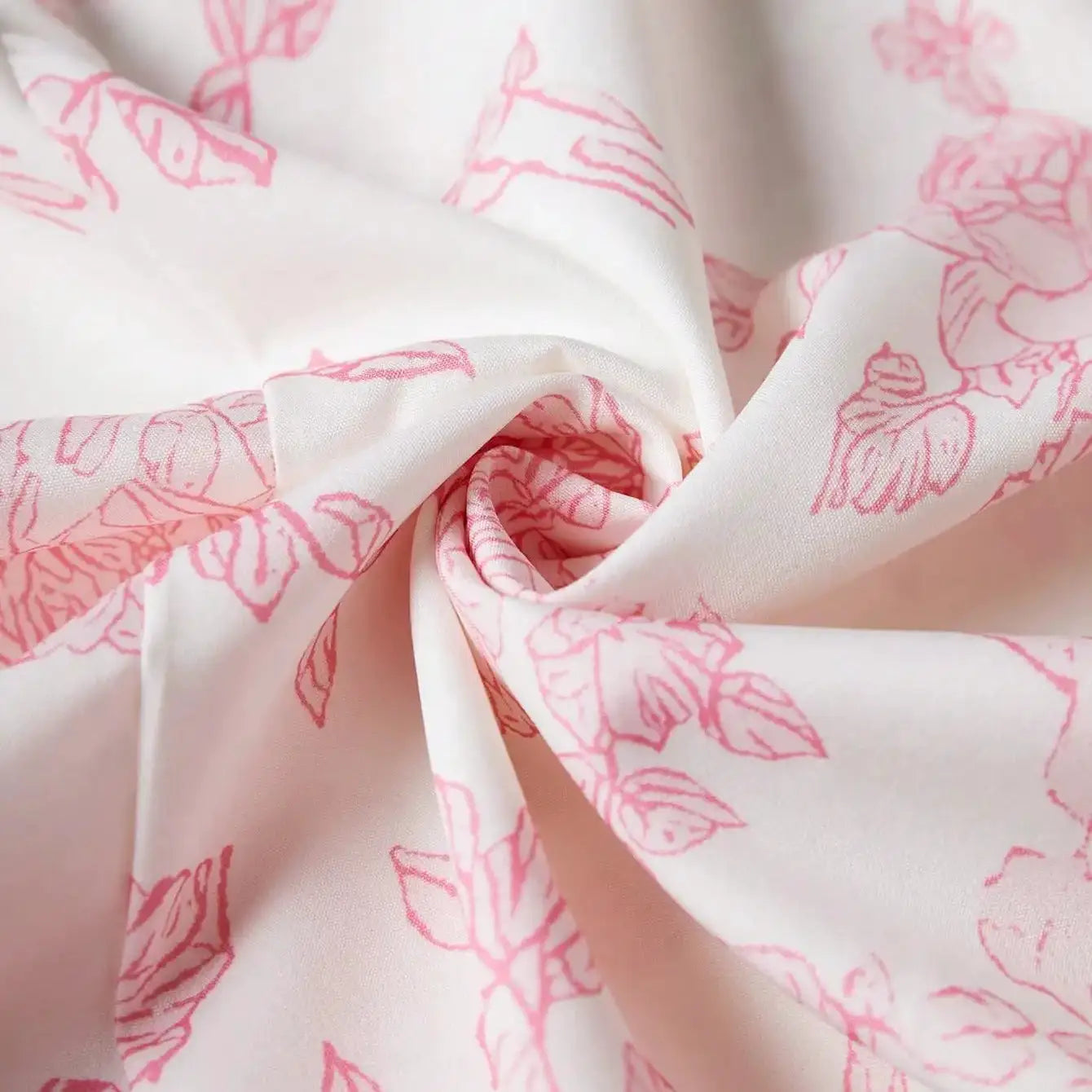 Robe longue florale rose LSDLBoutique – imprimé floral sur satin léger avec nœud