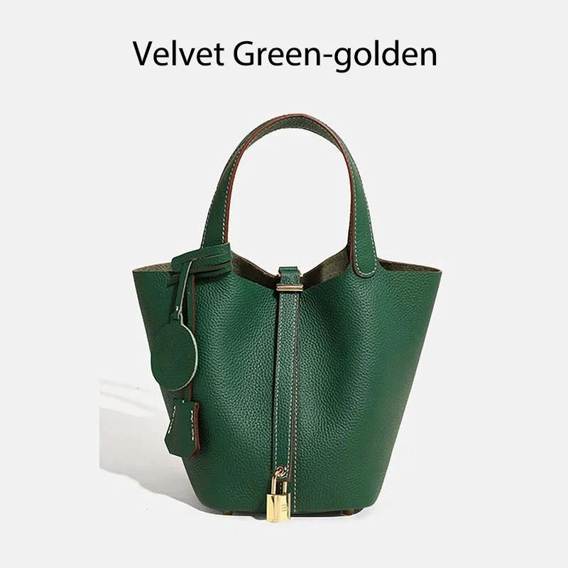 Sac à main seau Mendy en cuir véritable vert émeraude avec poignée et ferrures dorées