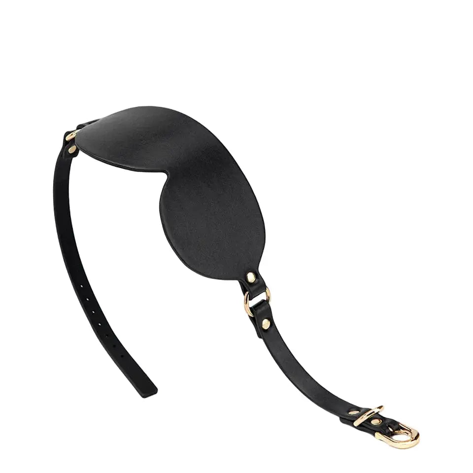 Masque pour les yeux en cuir synthétique riveté, noir, lanière ajustable avec ferrures dorées.