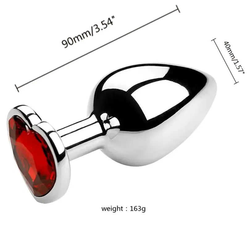 Plug anal en métal argenté avec cristal rouge à la base, design élégant